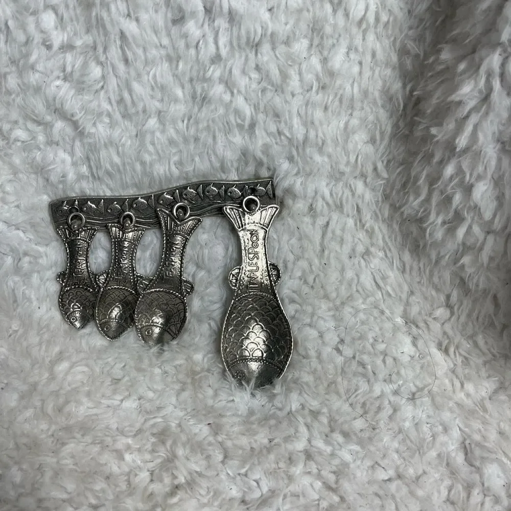 Vintage Tin Woodsman TWpewter set of four Fish measuring spoons with wall hanger